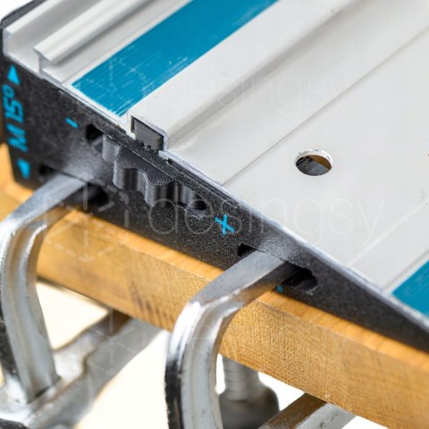 Dystans klin kątowy WedgeM15 cięcie 60° w miejsce 45° do prowadnicy Makita Dystans klin kątowy WedgeM15 cięcie 60° w miejsce 45° do prowadnicy Makita