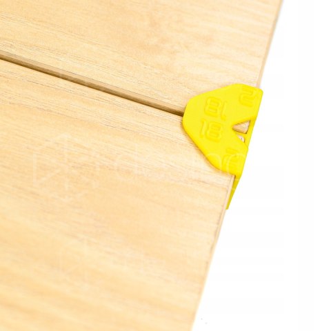 Uchwyty dystansowe do równego pozycjonowania i montażu frontów FrontGut18x2